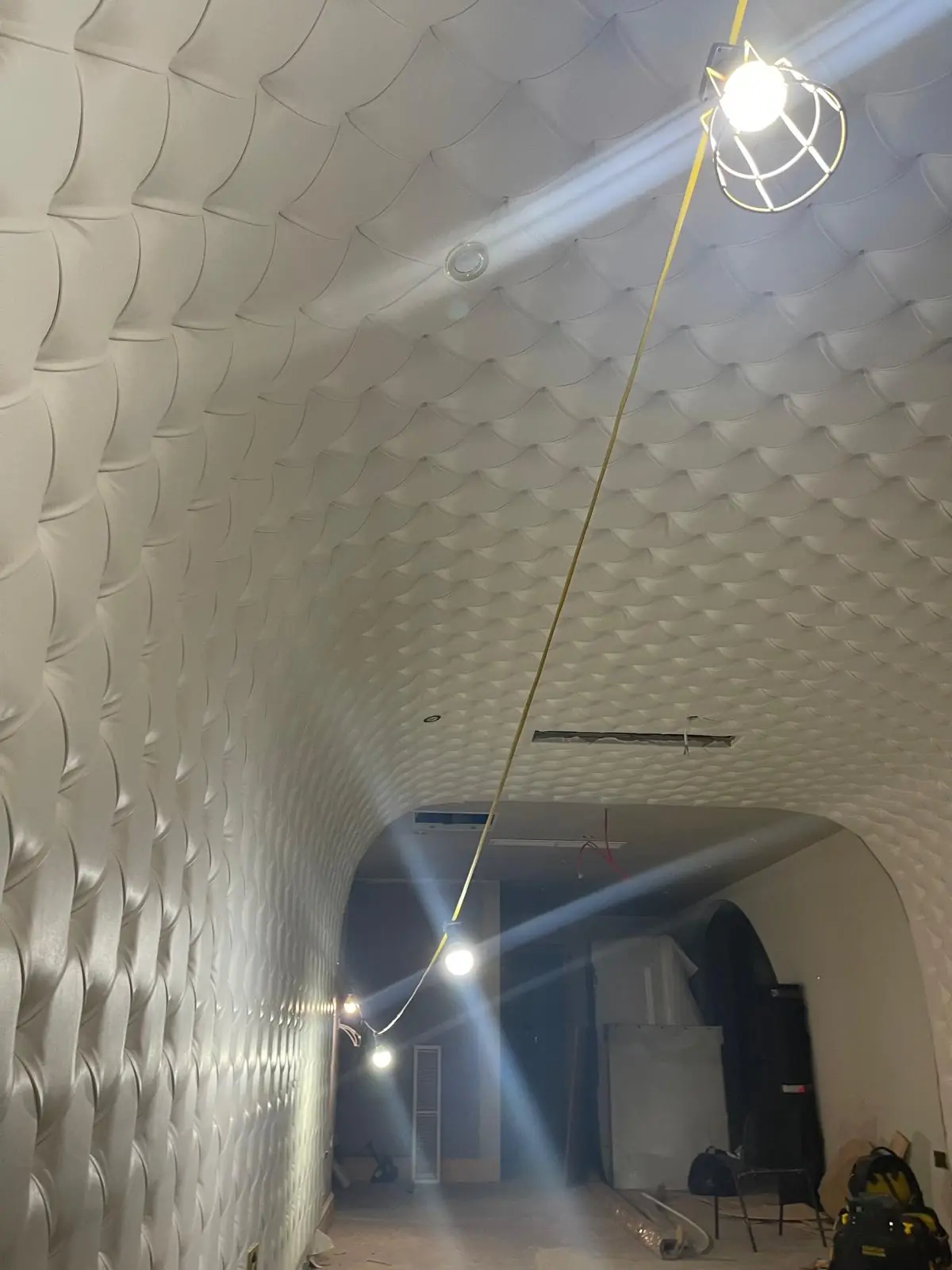 Upholstered vault with pendant lighting