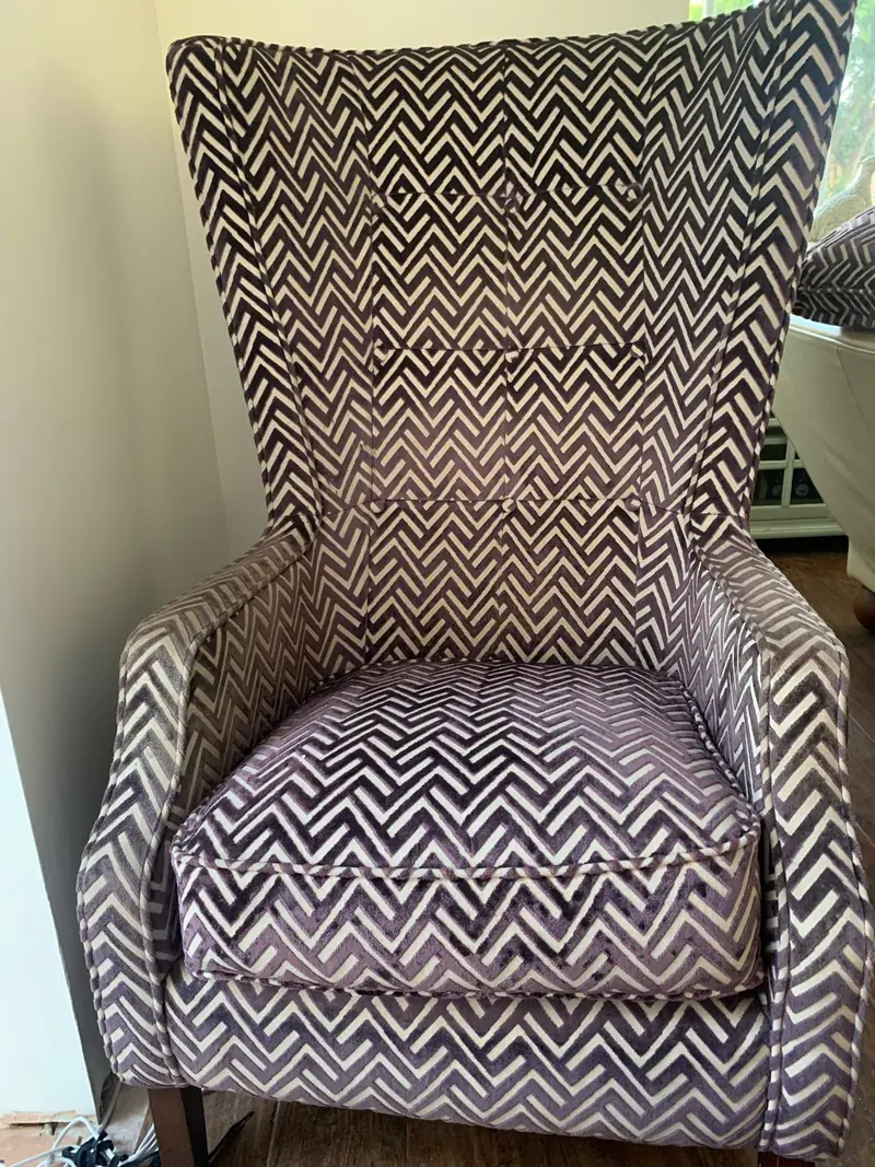 High-back armchair in a monochrome chevron