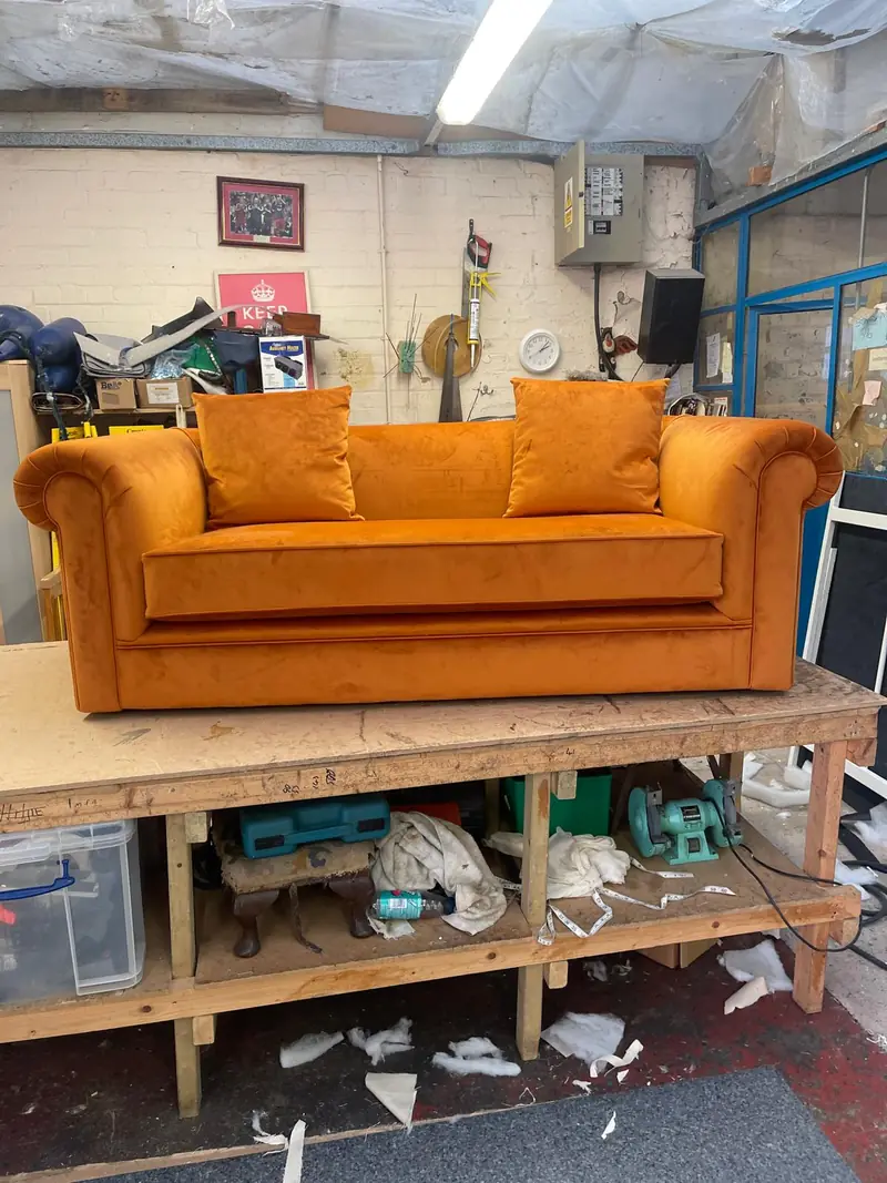 Buttoned chesterfield in burnt-orange velvet