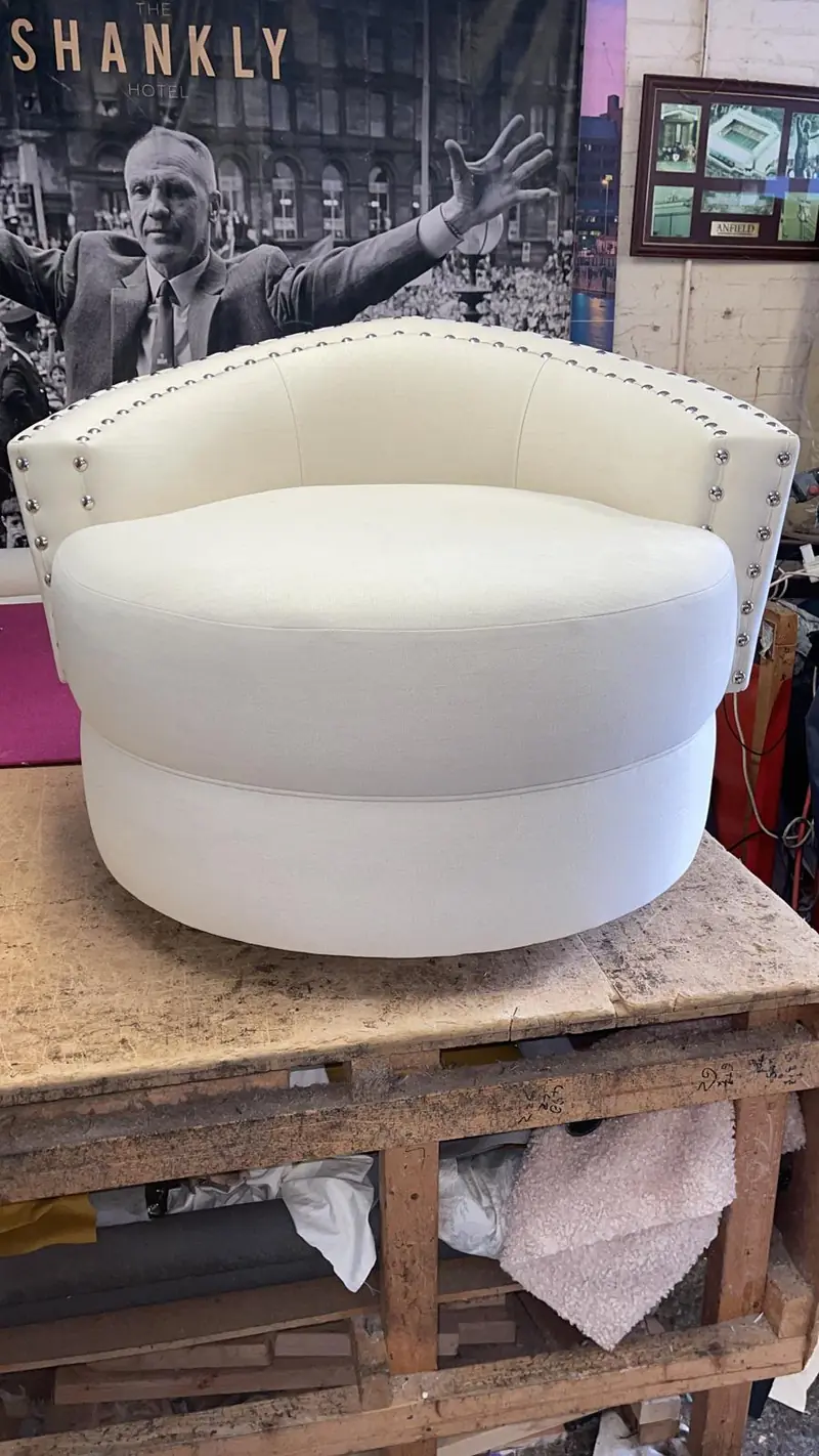 Curved studded ottoman seating