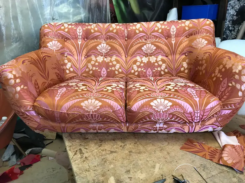 Sofa recovered in an art-deco fan pattern