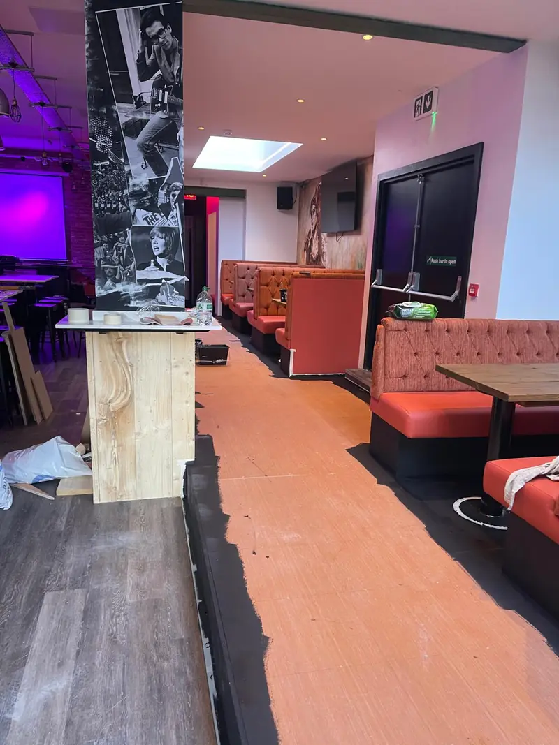 Bar fit-out, booth run being installed